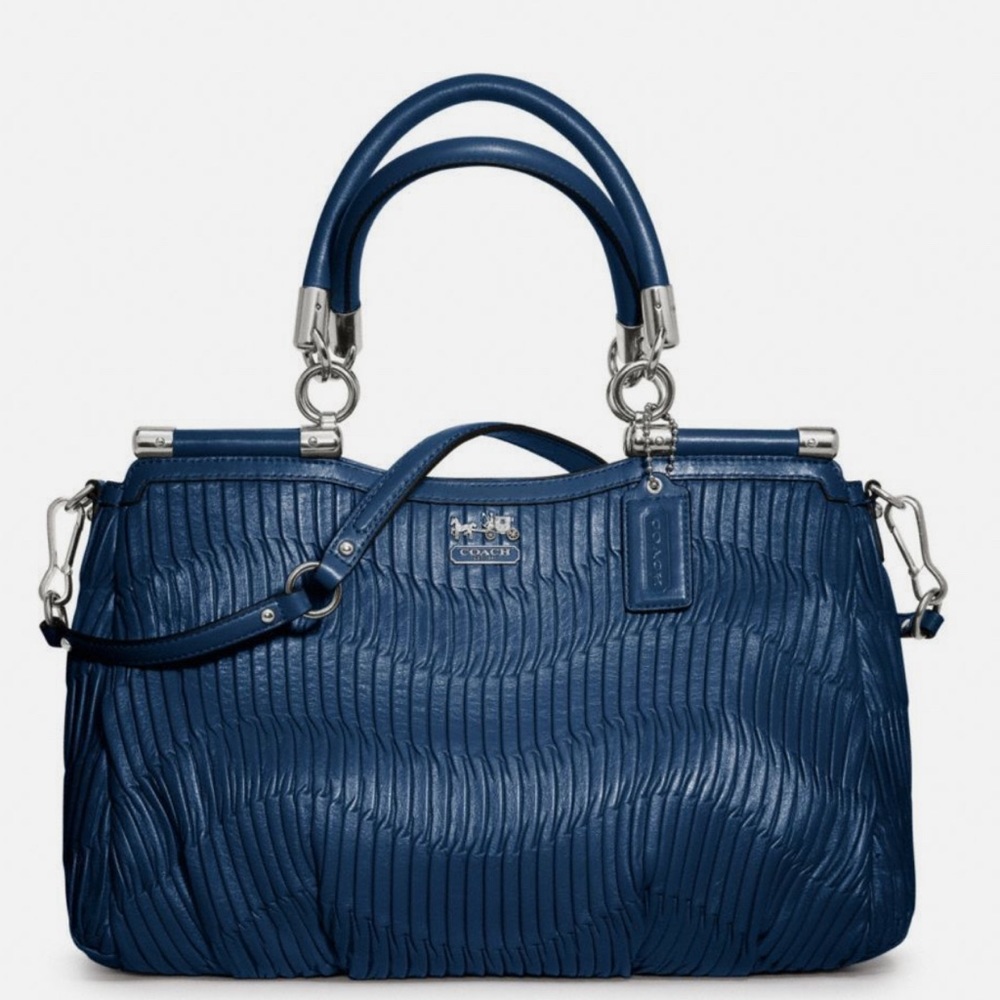 Both Used one time for three hours. Madison Lith Carrie bag. Coach Blue &coral